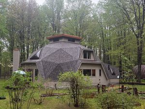 wooded lot roof damage